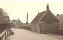 Scheef huisje naast de kerk 1962