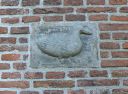 Gans in muur boven voordeur